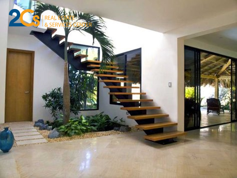 8 chú ý khi thiết kế cầu thang cho ngôi nhà hiện đại 4 Thiết kế cầu thang với tiểu cảnh nhỏ, đẹp.